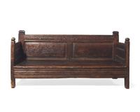 An unusual Charles II carved walnut bed, 17th century