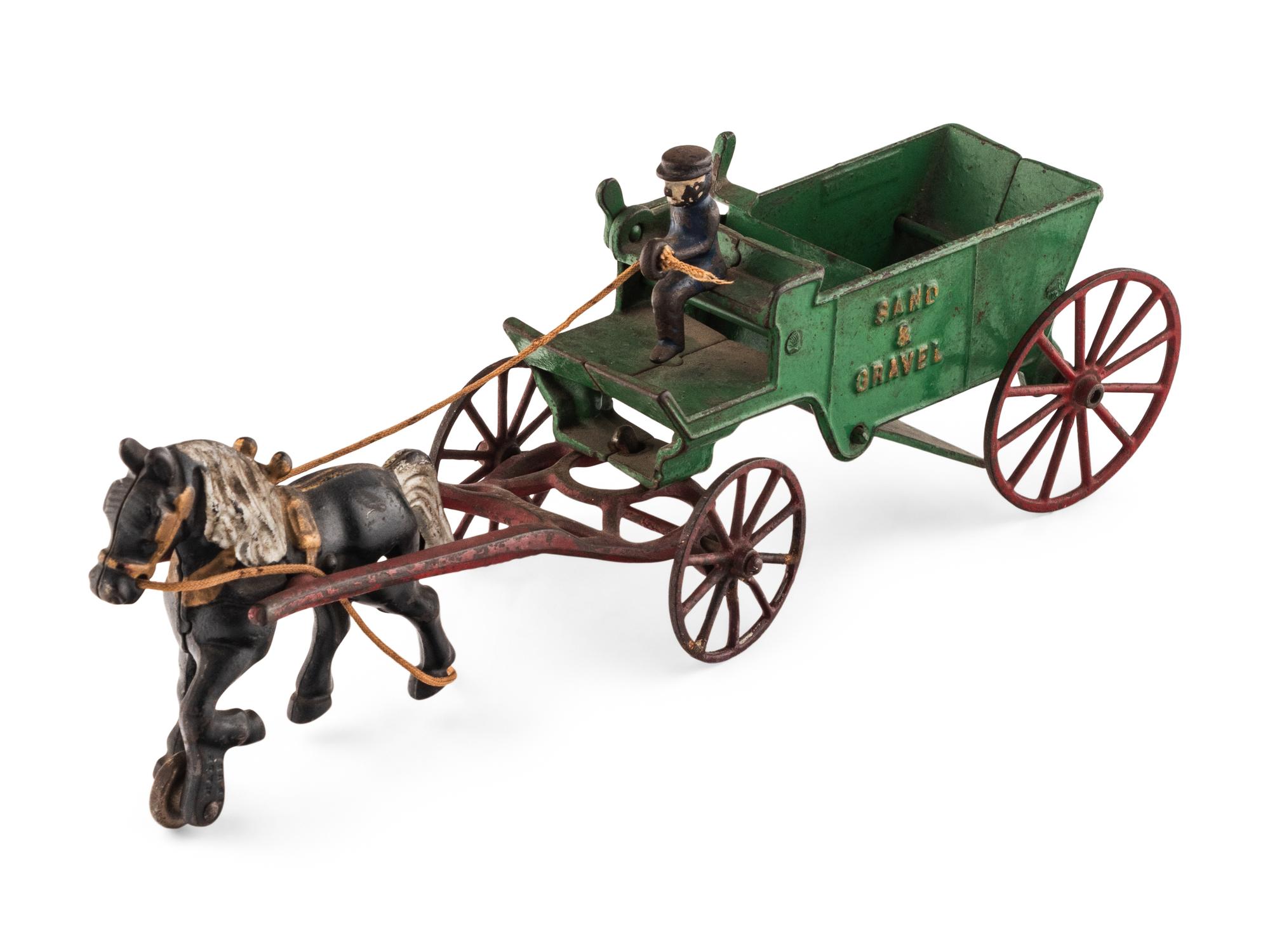 A Group of Three Cast Iron Horse-Drawn Carts