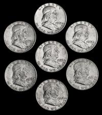 A Collection of Seven United States Benjamin Franklin 50C Coins
