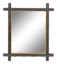 A Black Forest Faux Bois Carved Mirror