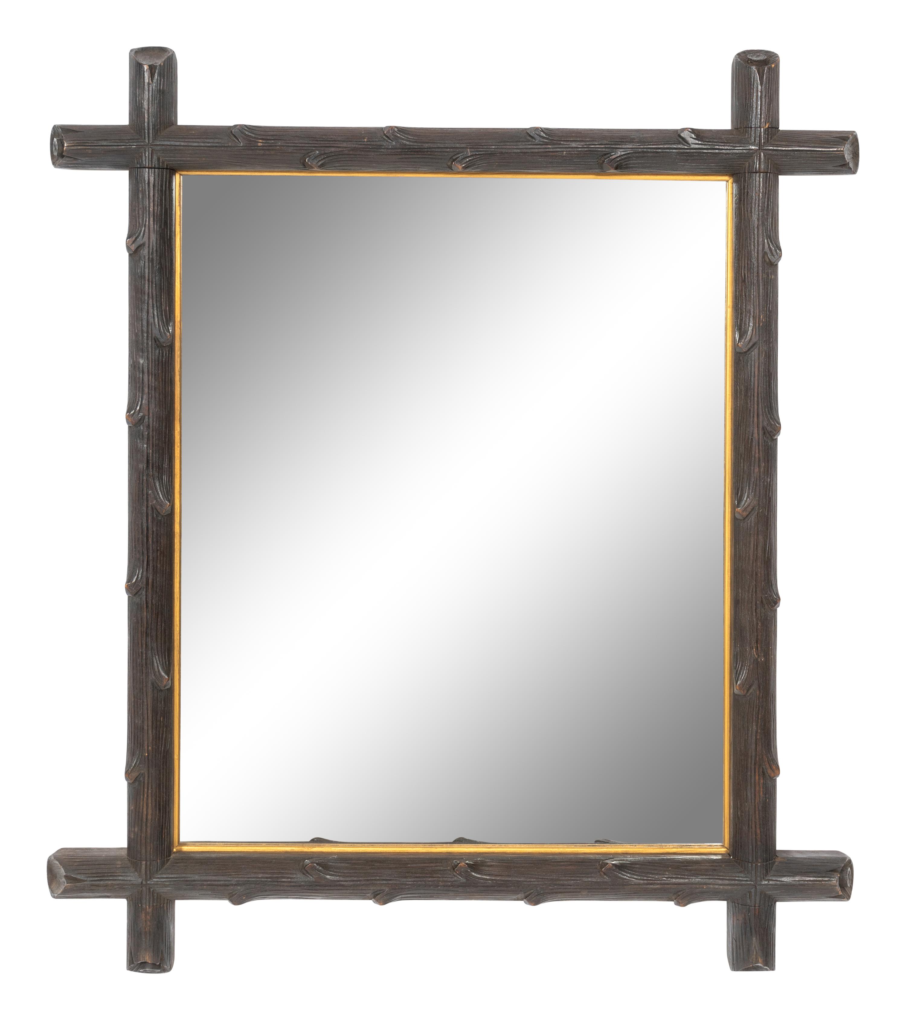 A Black Forest Faux Bois Carved Mirror