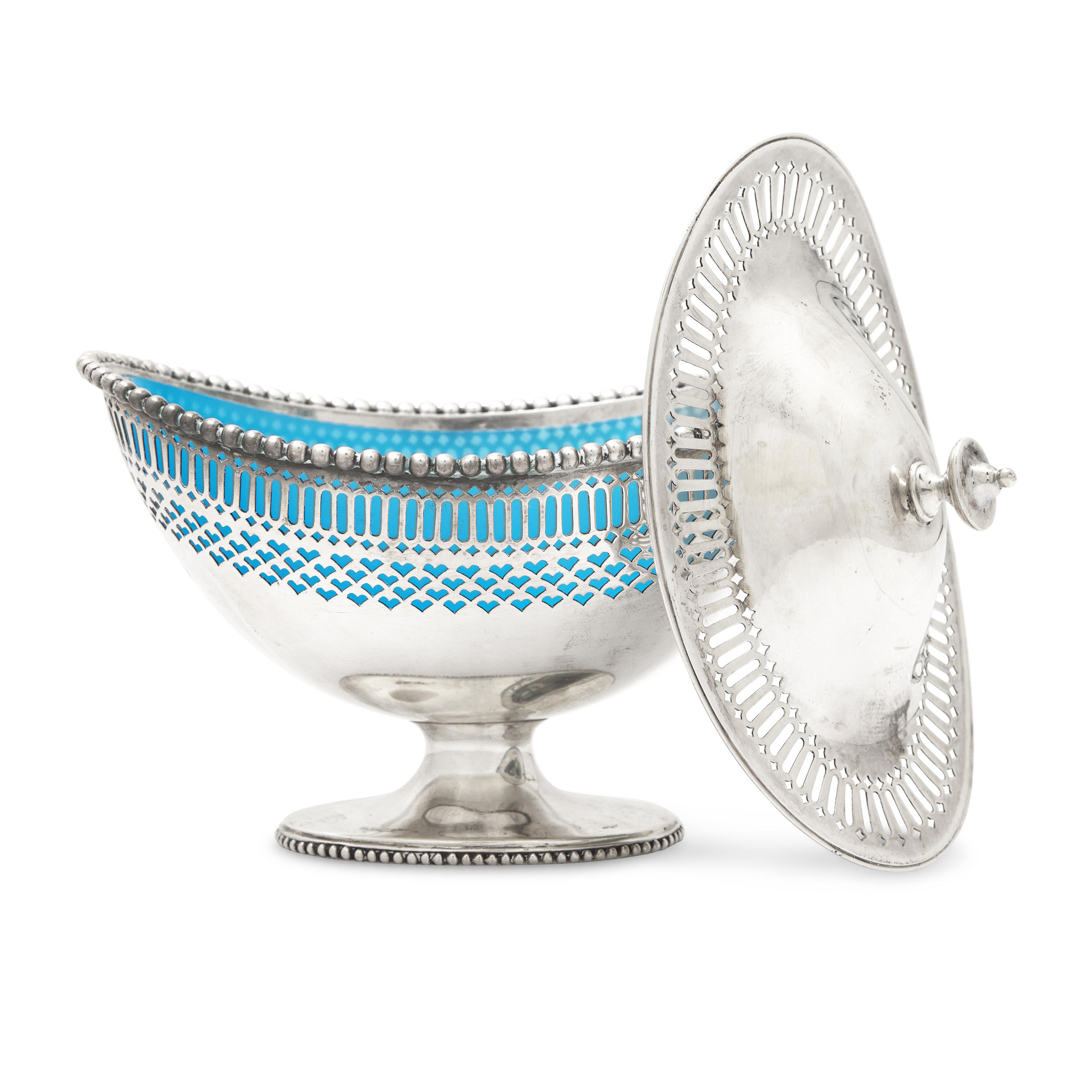 An Engraved and Pierced Coin Silver Glass-Lined Sugar Basket