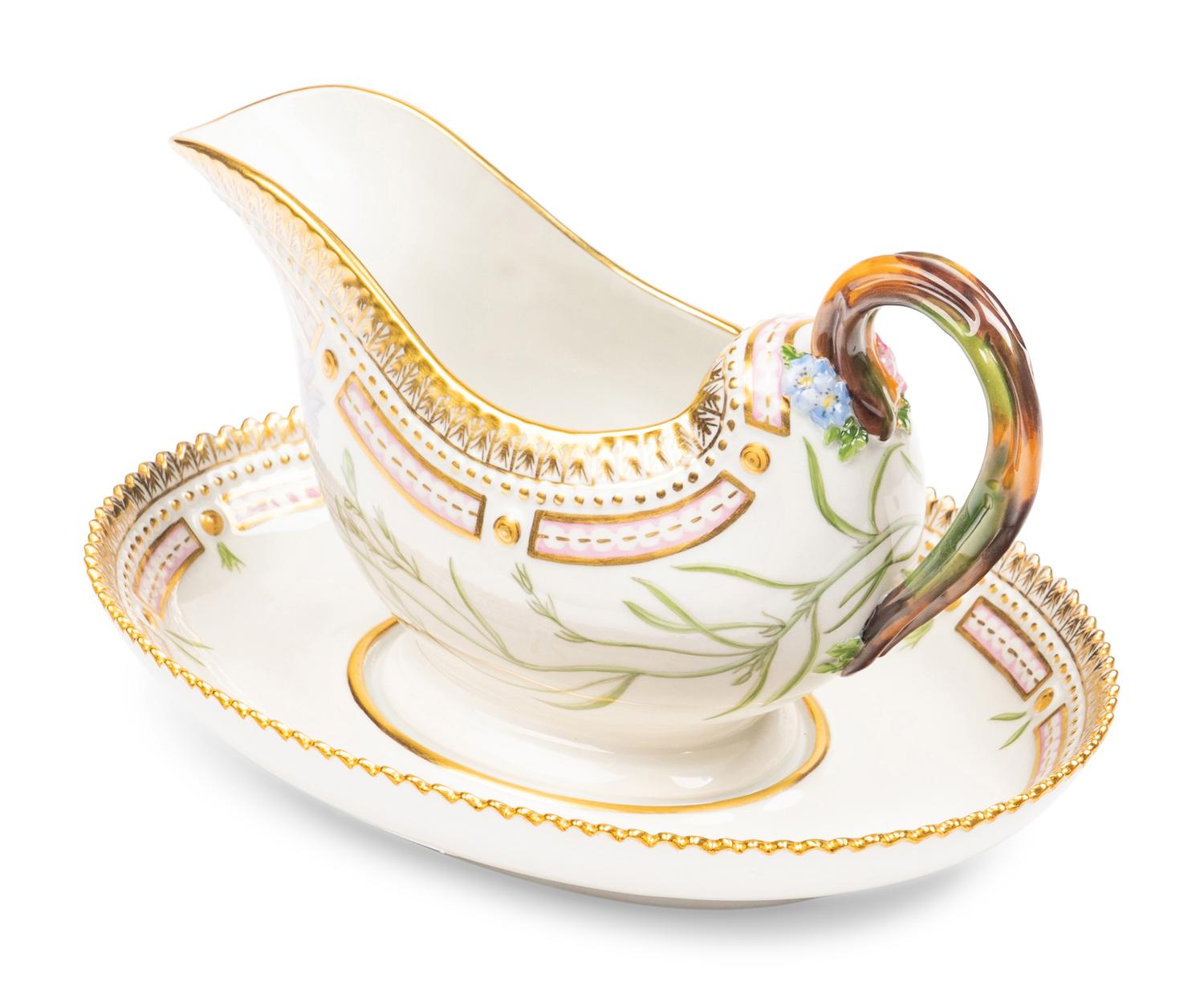 A Royal Copenhagen Flora Danica Porcelain Sauce Boat and Fixed Stand