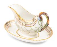 A Royal Copenhagen Flora Danica Porcelain Sauce Boat and Fixed Stand