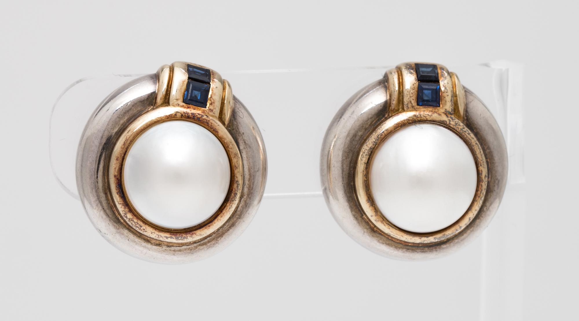 A Pair of Sterling Silver, 18 Karat Yellow Gold, Mabe Pearl and Sapphire Earclips, Tiffany & Co., Circa 1984, 16.10 dwts.