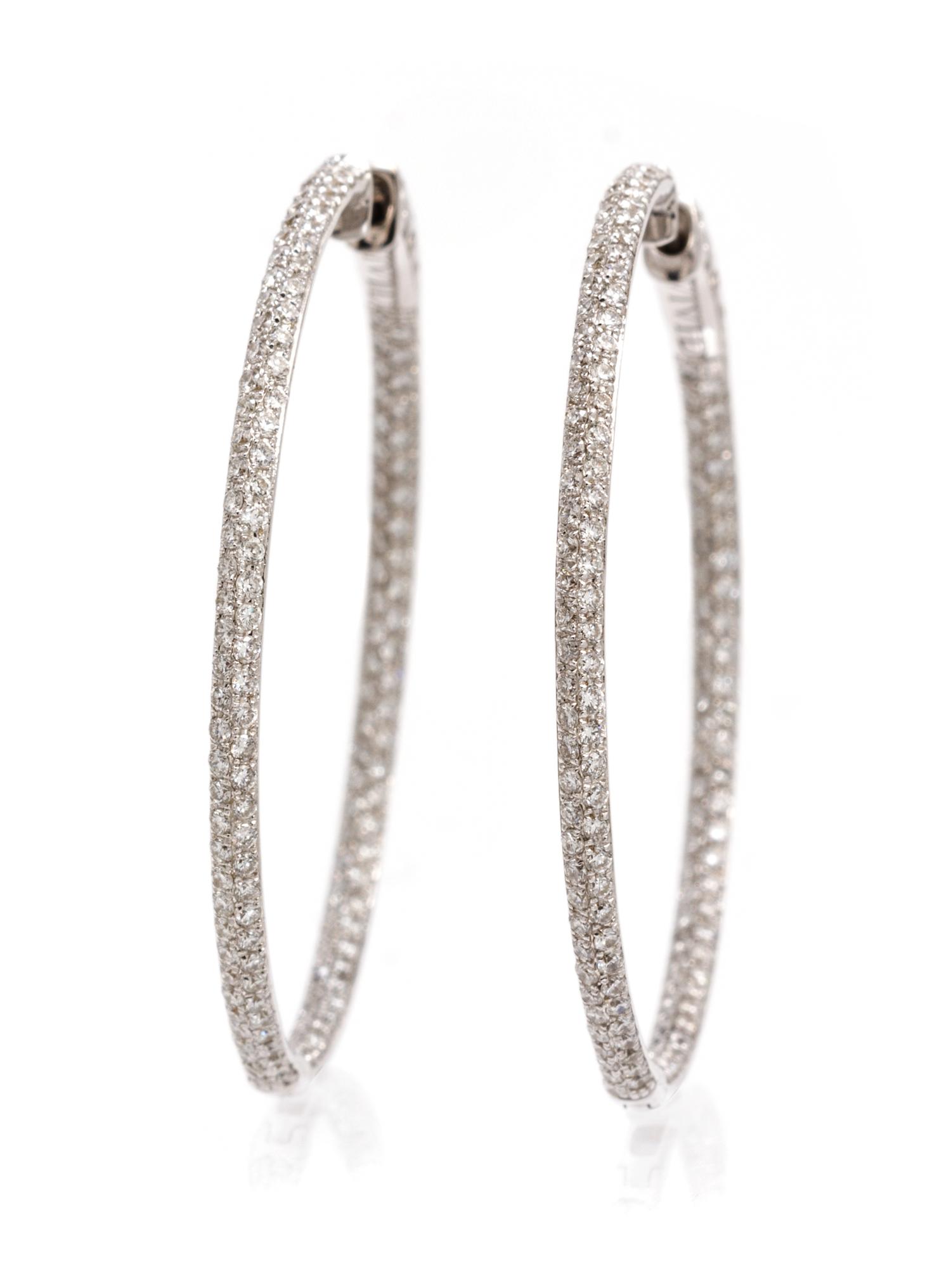 A Pair of 18 Karat White Gold and Diamond Hoop Earrings, 4.50 dwts.
