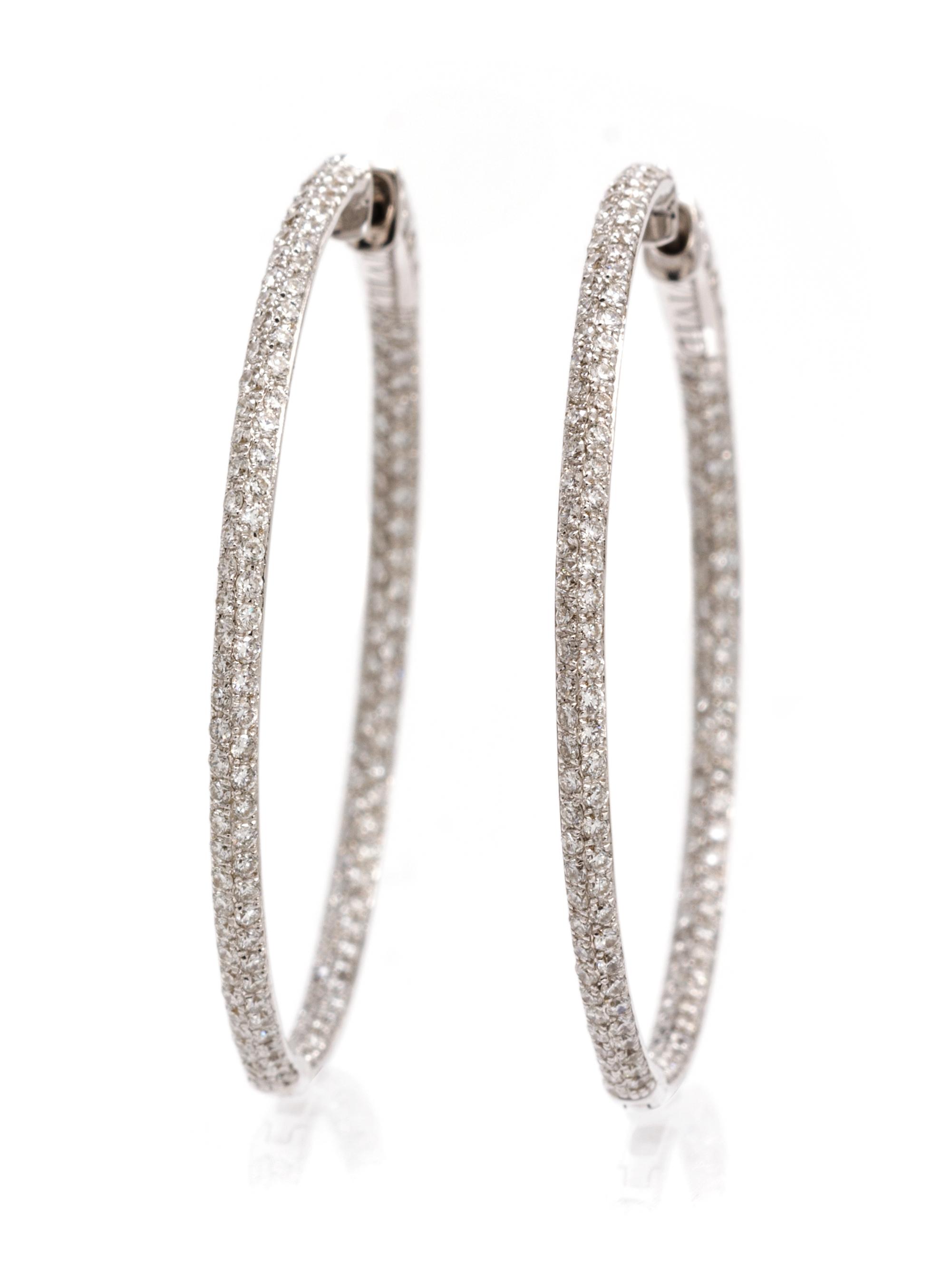 A Pair of 18 Karat White Gold and Diamond Hoop Earrings, 4.50 dwts.
