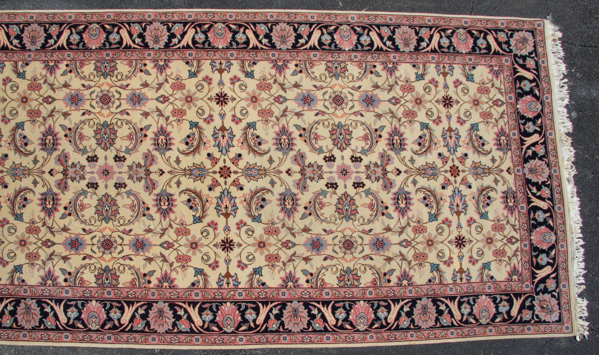 A Persian Style Wool Rug 14 feet 1 inch x 6 feet 10 inches. — SECOND HALF 20TH CENTURY