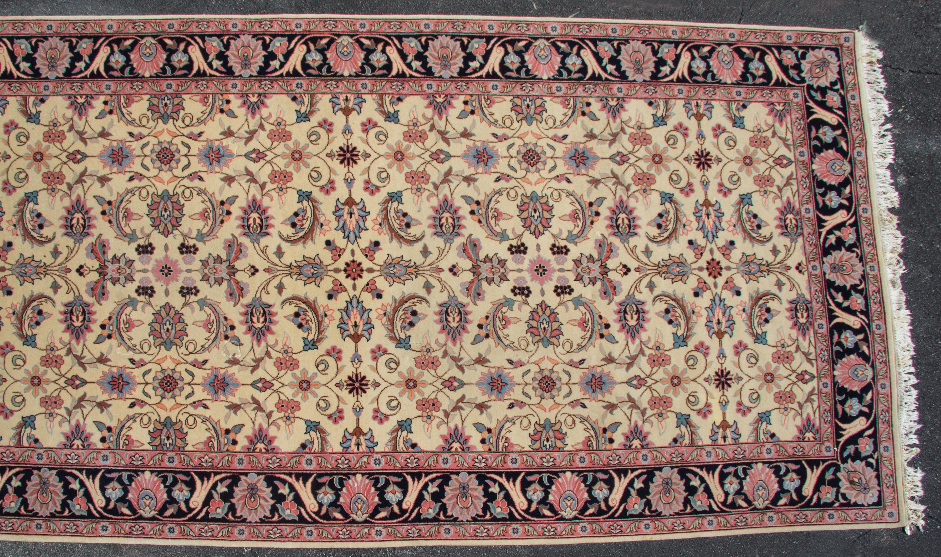 A Persian Style Wool Rug 14 feet 1 inch x 6 feet 10 inches. — SECOND HALF 20TH CENTURY