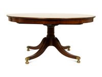 A Regency Style Mahogany "Jupe" Metamorphic Dining Table — 20TH CENTURY