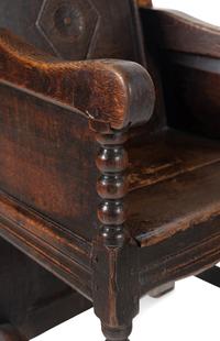 A Charles II Oak Armchair