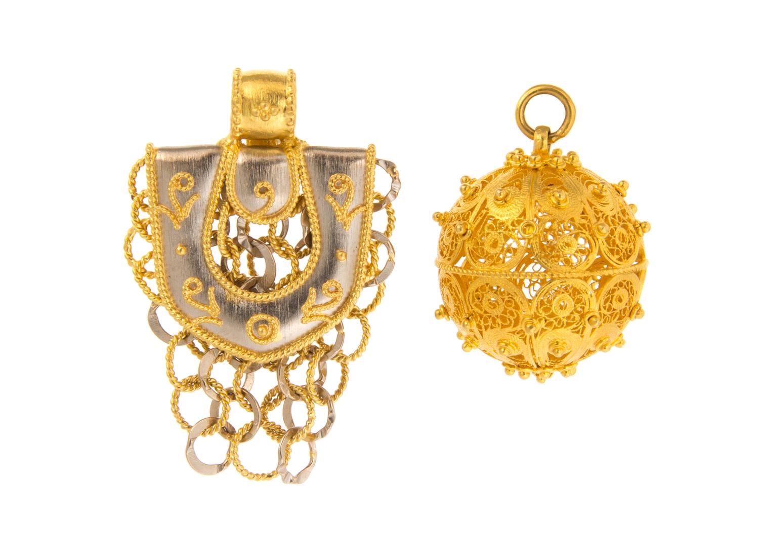 A Collection of 21 Karat White and Yellow Gold Pendants, 29.00 dwts.