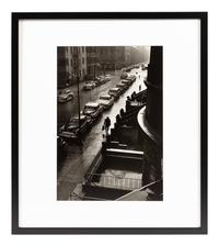 Ruth Orkin (1921-1985) Man in Rain, W. 86th Street, NYC, 1952