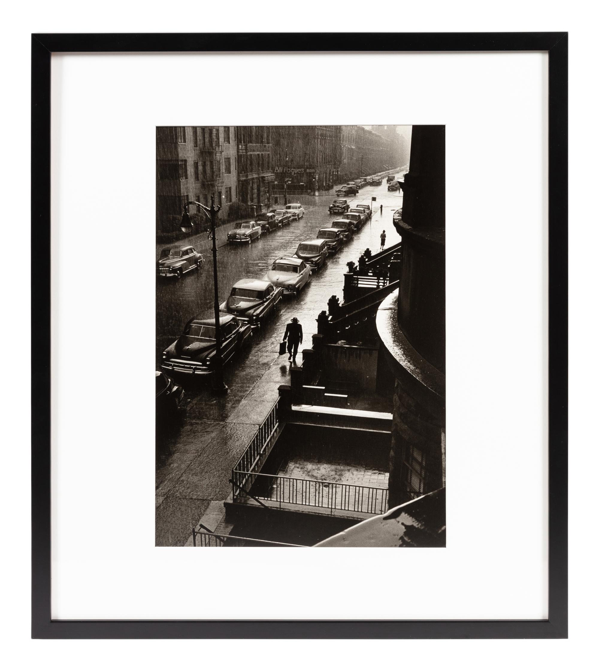 Ruth Orkin (1921-1985) Man in Rain, W. 86th Street, NYC, 1952