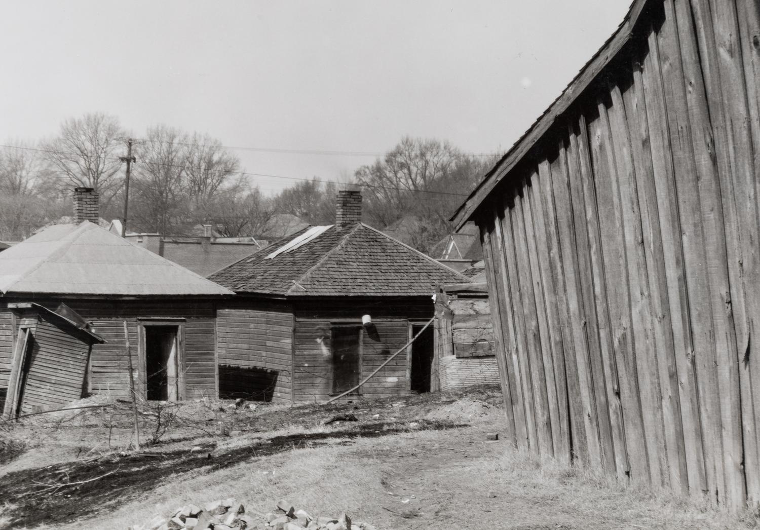 Walker Evans (1903-1975) Scott's Rim Mining Camp, near Morgantown, West Virginia; Untitled (Miners' huts;) and Company Houses for Miners, Masontown, Near Preston County, West Virginia, 1935