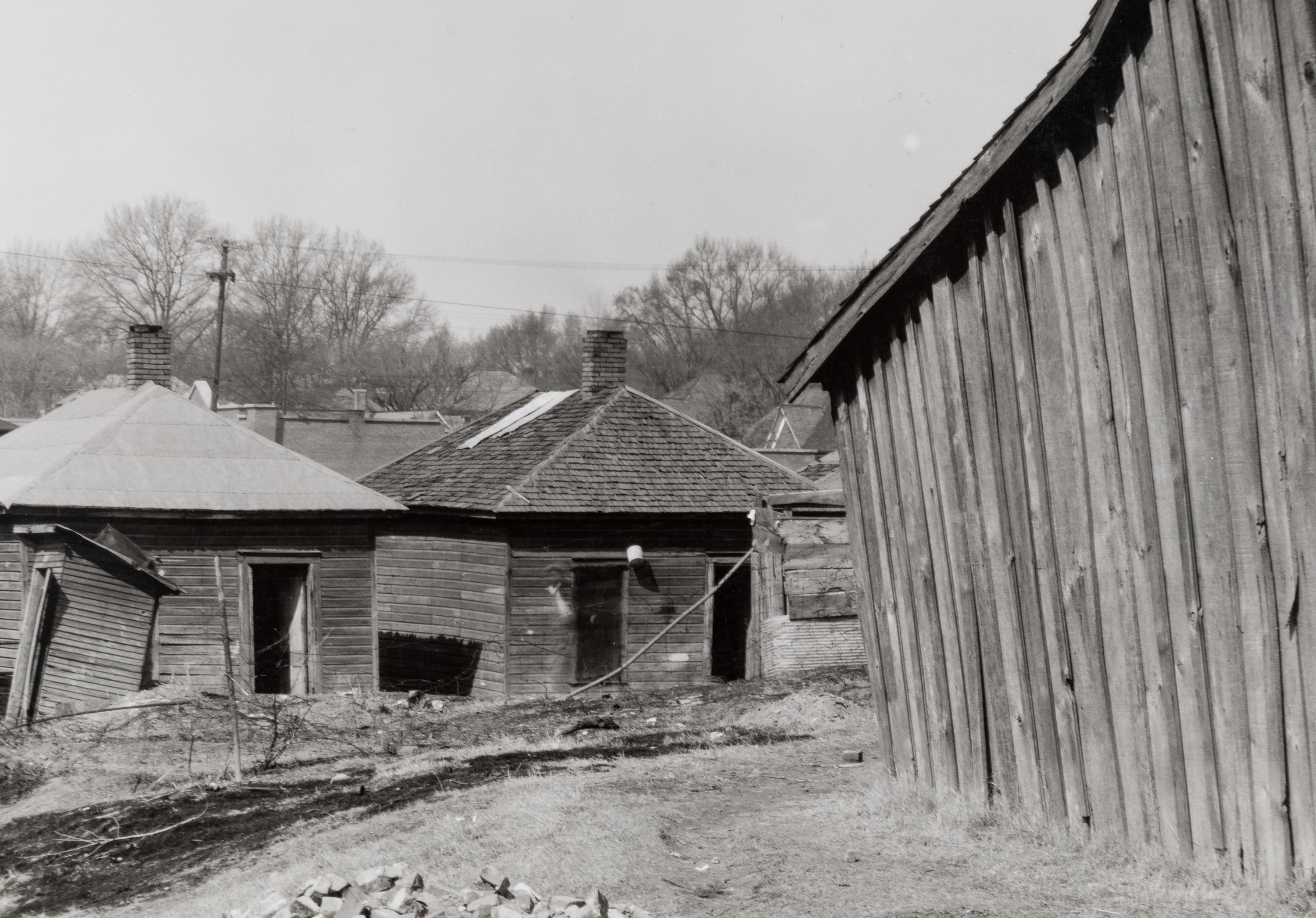 Walker Evans (1903-1975) Scott's Rim Mining Camp, near Morgantown, West Virginia; Untitled (Miners' huts;) and Company Houses for Miners, Masontown, Near Preston County, West Virginia, 1935