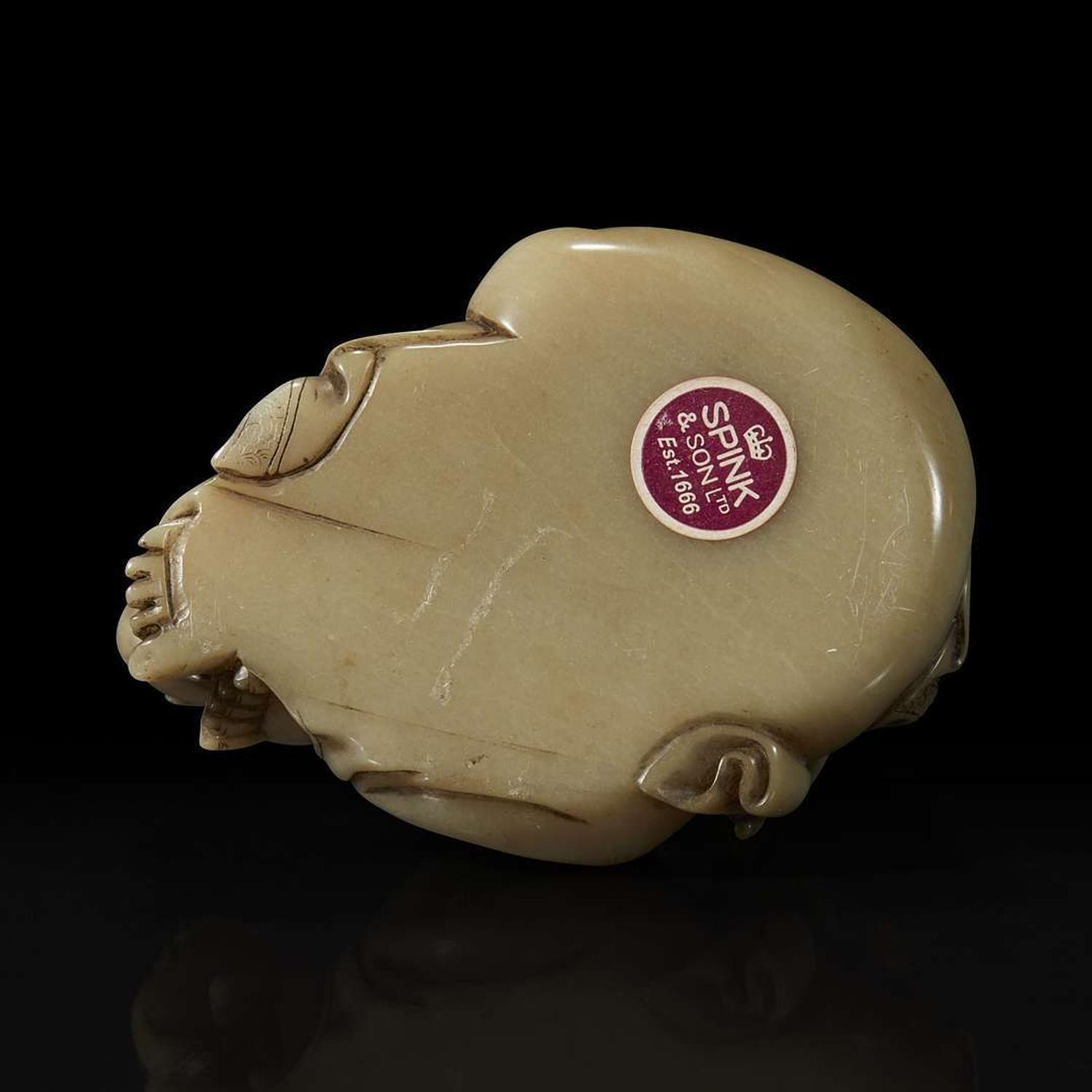 A Chinese carved soapstone figure of a seated Budai 寿山石雕布袋和尚