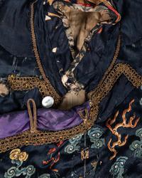 A Chinese Navy Blue Ground Embroidered Silk Court Robe, Chaofu