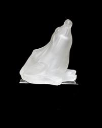 A Lalique Molded and Frosted Glass Animalier Figure Height 6 5/8 inches.