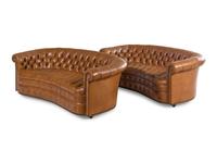 A Pair of Faux Leather Upholstered Chesterfield Sofas
