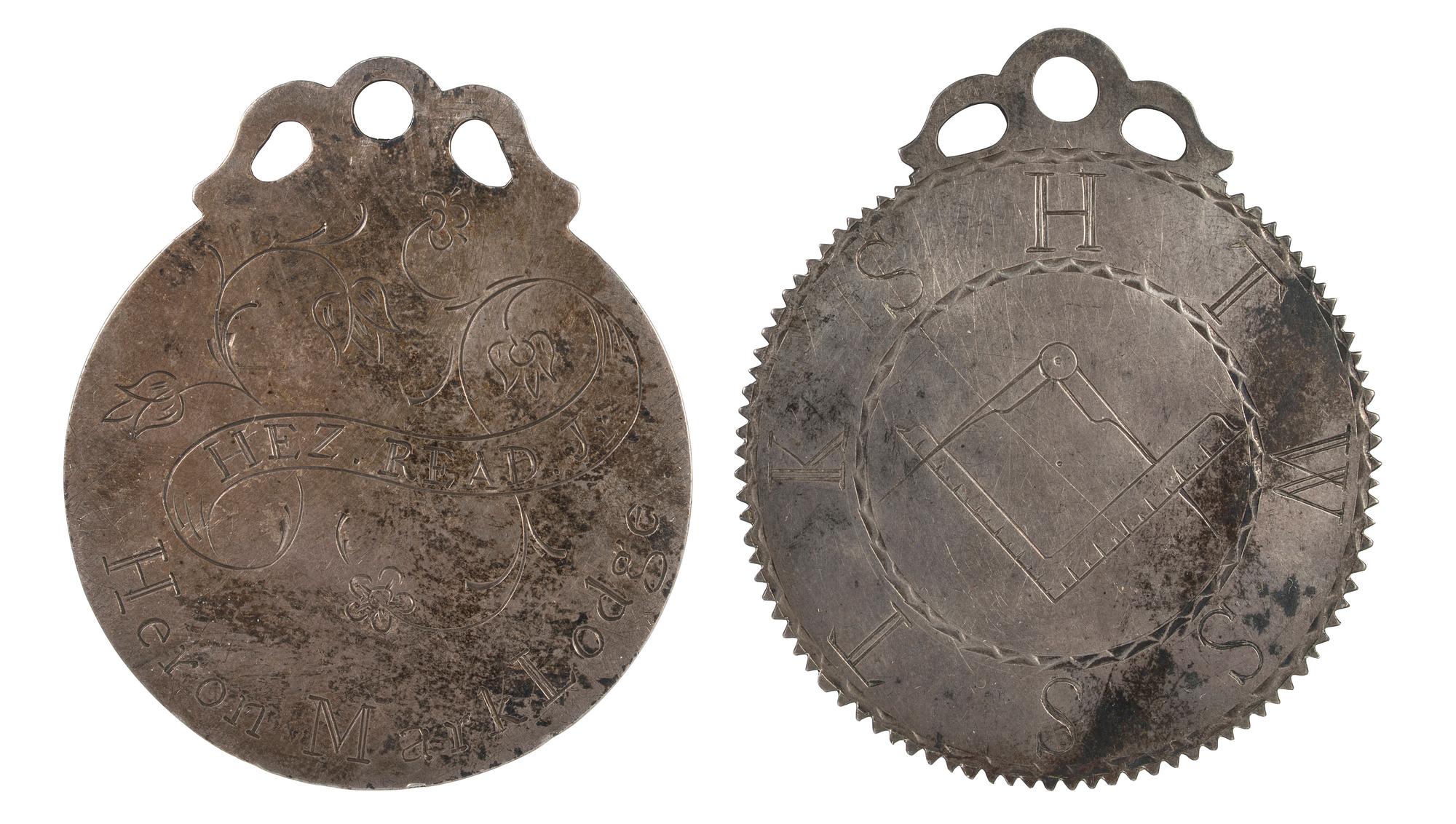 [FRATERNAL ORGANIZATIONS]. Pair of Masonic Master Mark medals from the Heron Mark Lodge. Ca early 19th century.