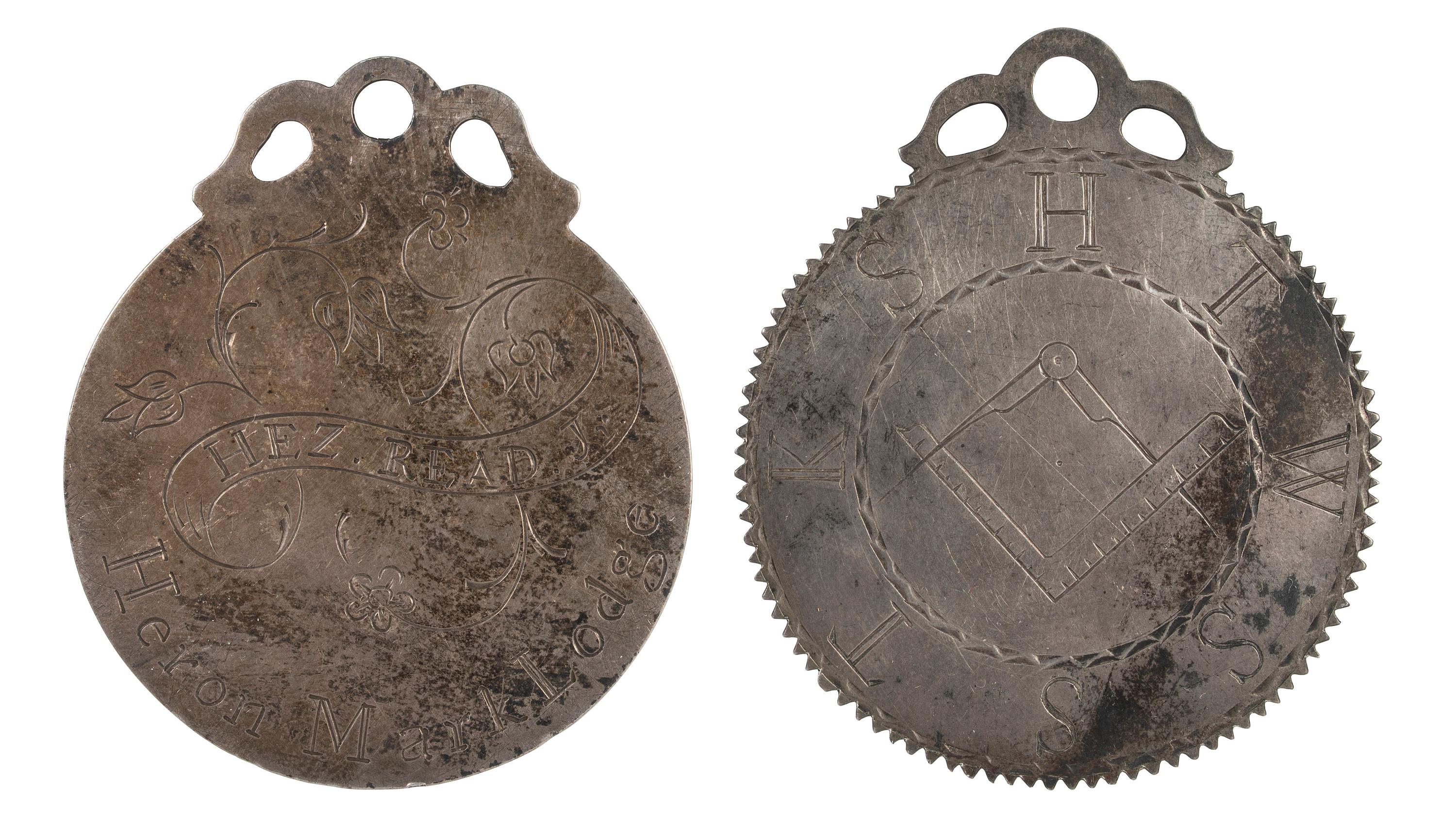 [FRATERNAL ORGANIZATIONS]. Pair of Masonic Master Mark medals from the Heron Mark Lodge. Ca early 19th century.