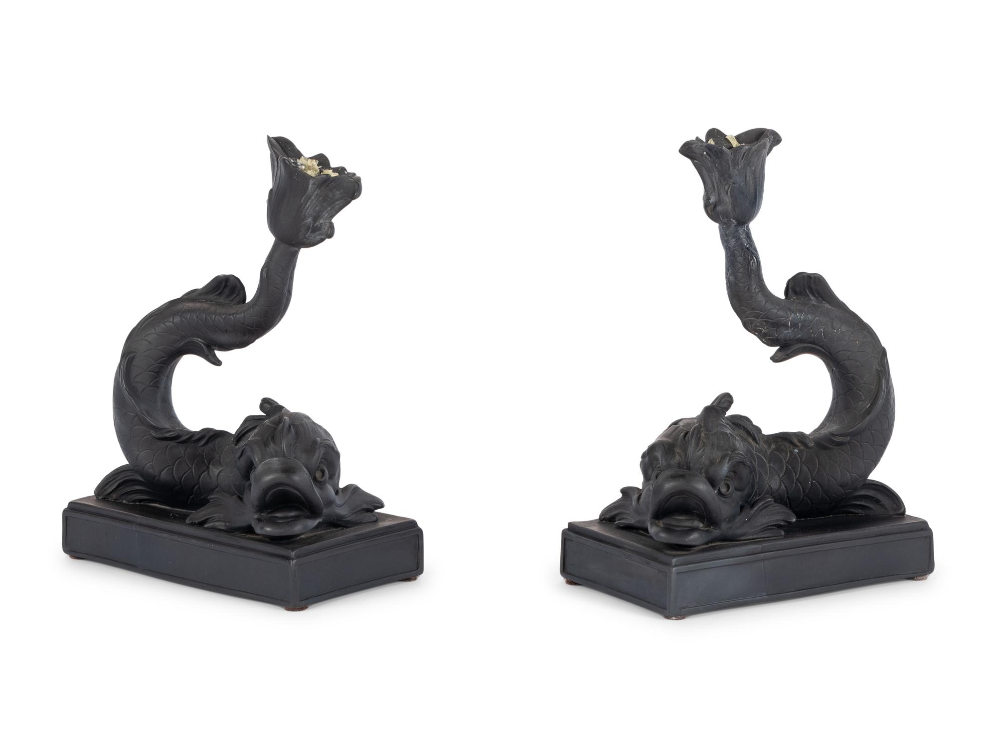 A Pair of Wedgwood Basalt Dolphin Candlesticks
