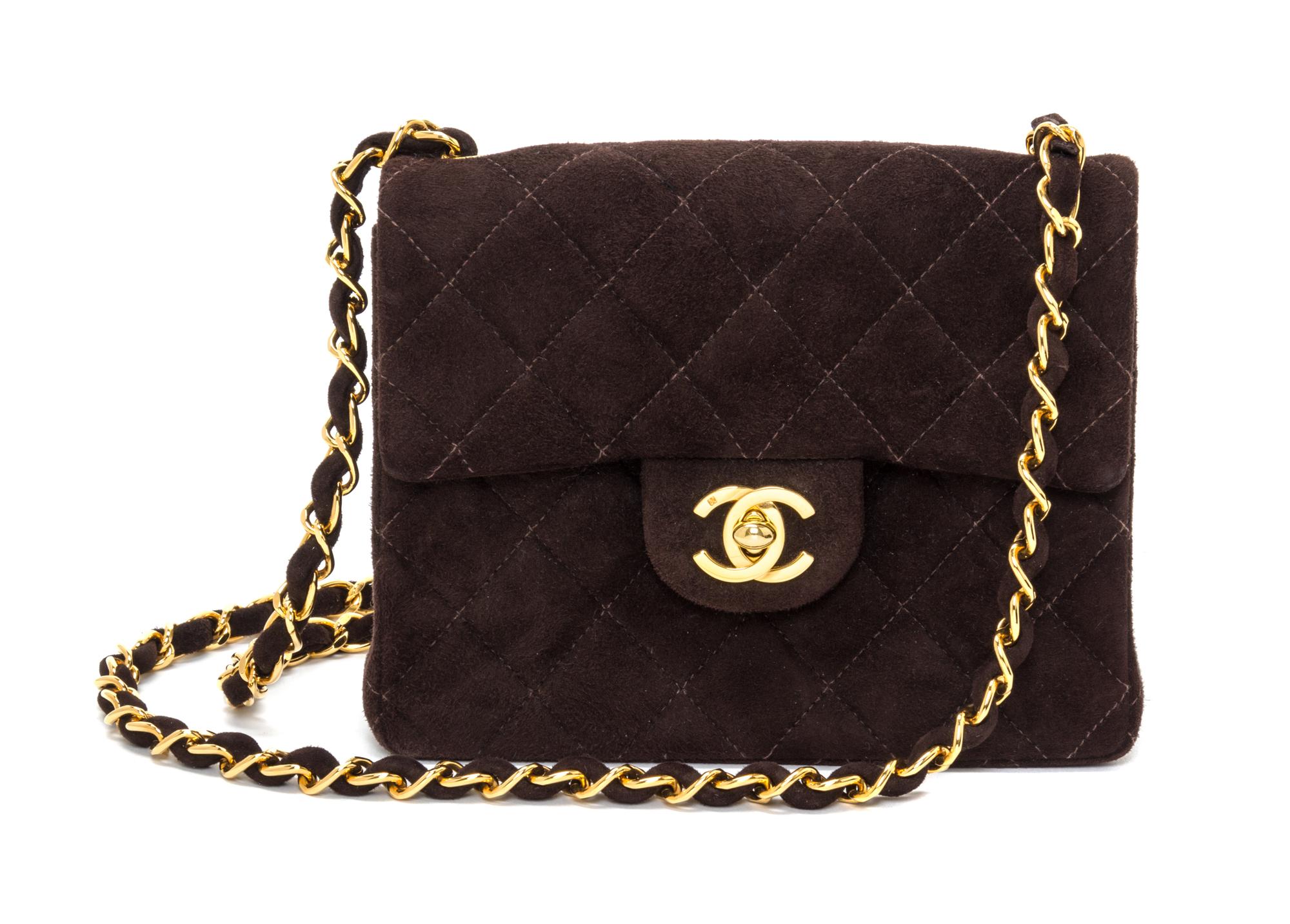 A Chanel Brown Suede Quilted Mini Flap Bag, 6.5" x 5" x 2.5".