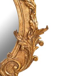 A Baroque Style Giltwood Mirror