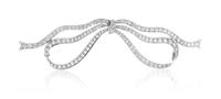 An Edwardian Platinum Topped Gold and Diamond Bow Brooch, 9.10 dwts.