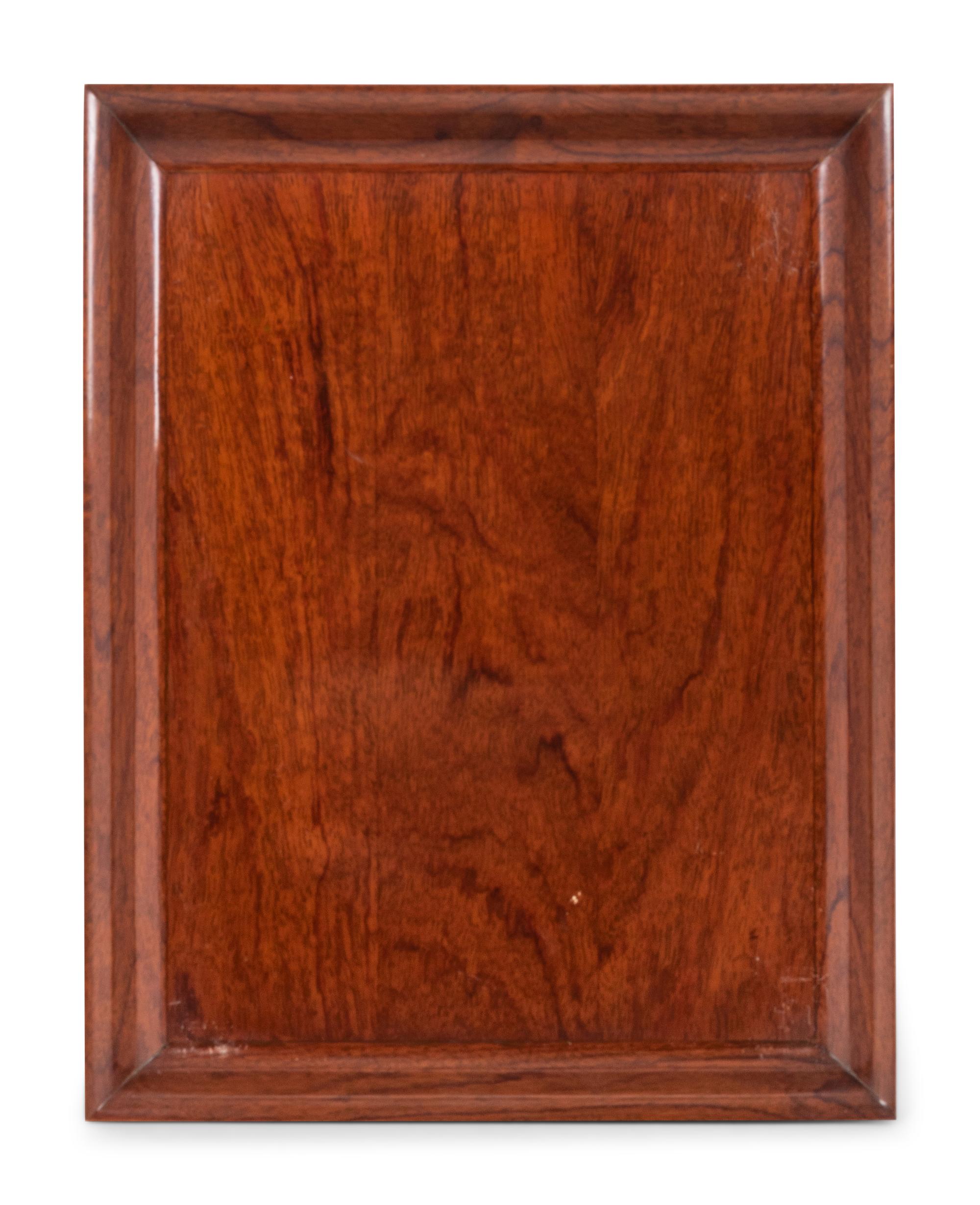 An Hermès Rosewood Tray with Two Smaller Associated Trays