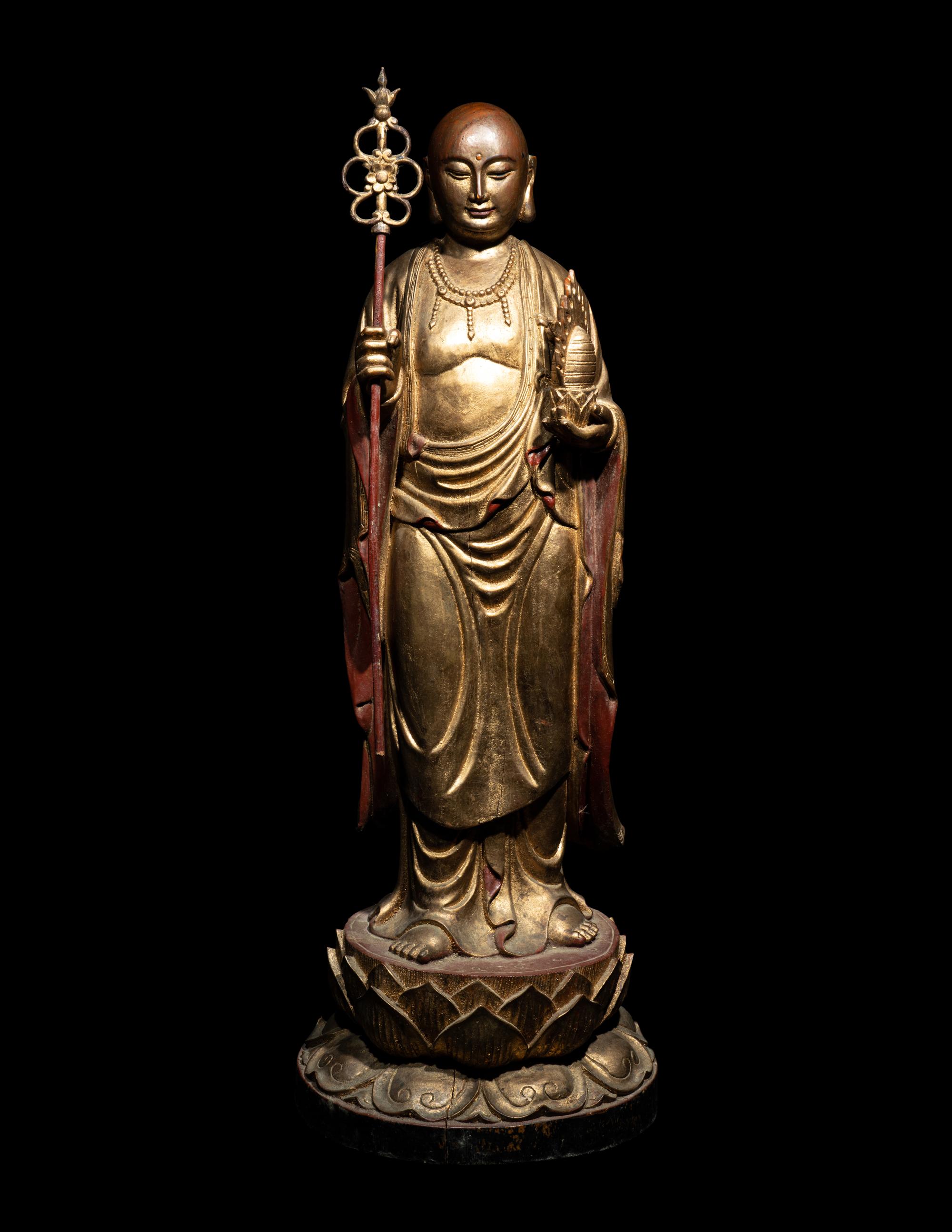 A Chinese Gilt and Lacquered Wood Figure of a Standing Monk