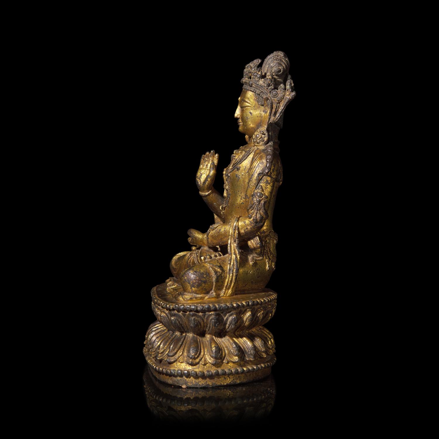 A Chinese Gilt Bronze Figure of a Seated Bodhisattva, Ming Dynasty, 15th Century 明 銅鎏金菩薩坐像