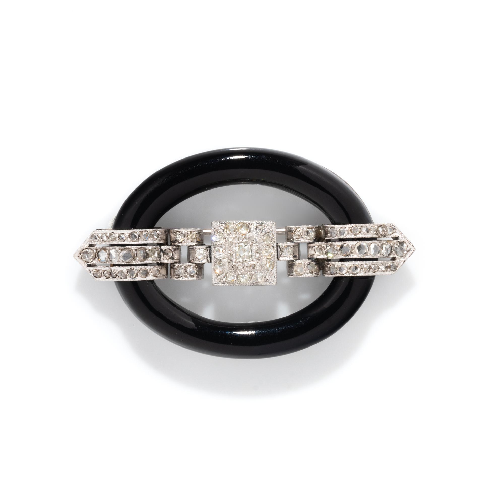 ART DECO, ONYX AND DIAMOND BUCKLE BROOCH