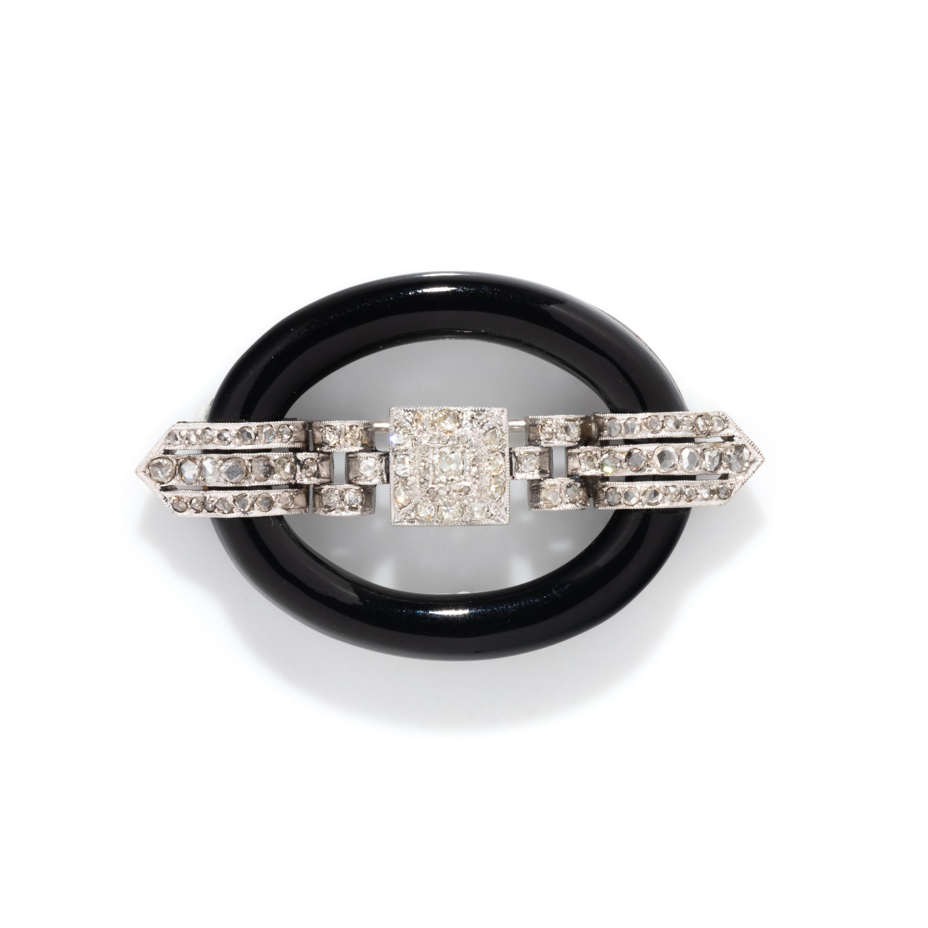 ART DECO, ONYX AND DIAMOND BUCKLE BROOCH