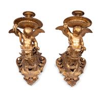 A Pair of Italian Giltwood Figural Wall Brackets