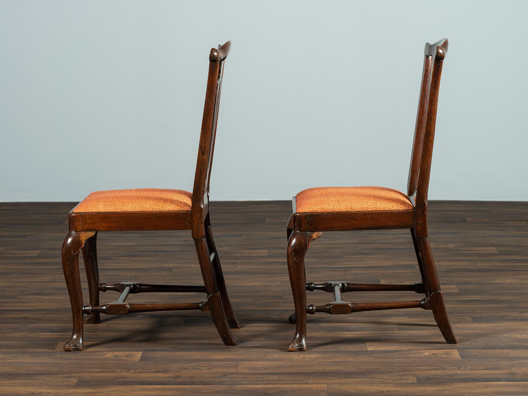 A Set of Six Queen Anne Pierce Carved Mahogany Stretcher Base and Trifid Foot Side Chairs