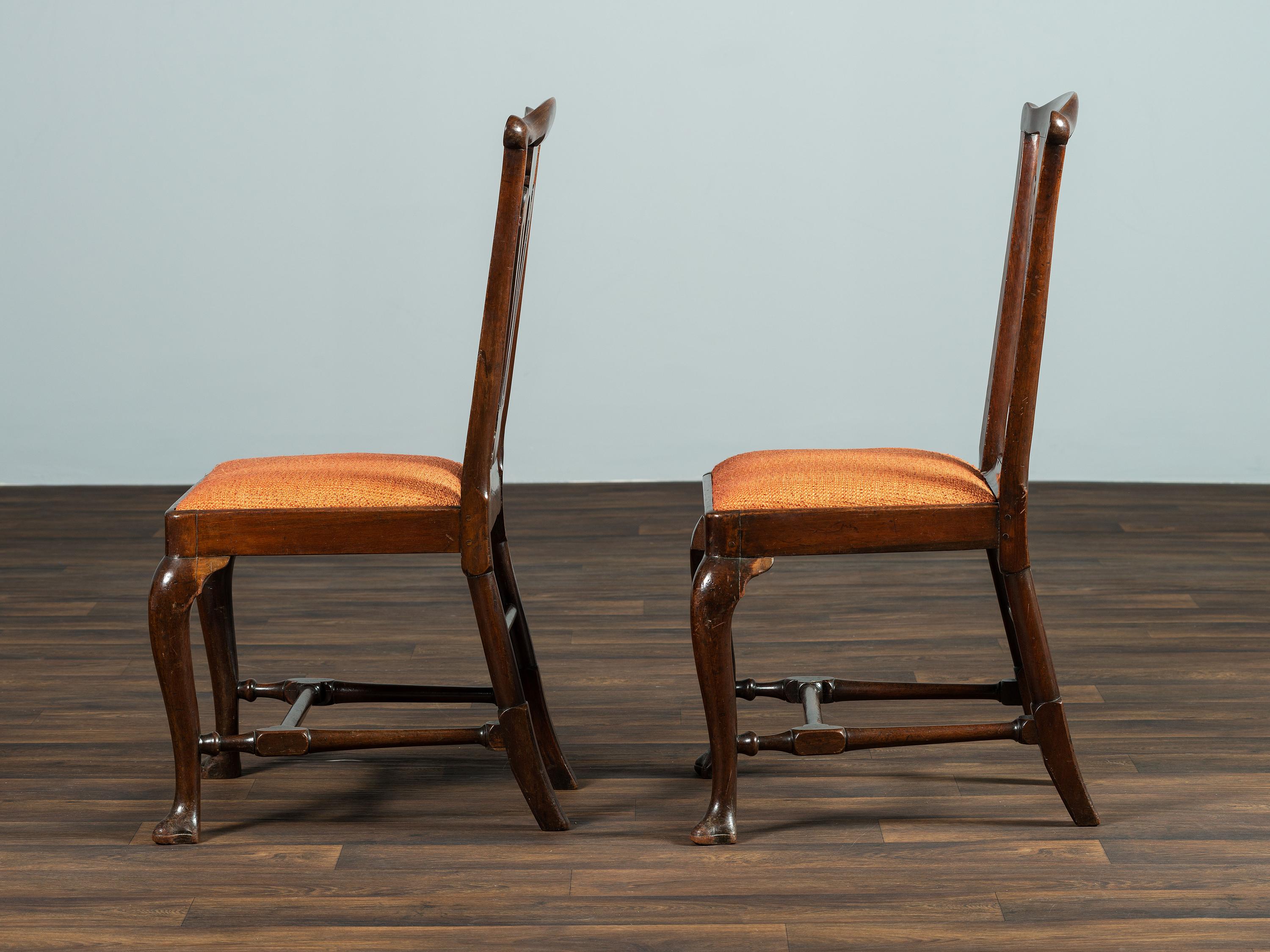 A Set of Six Queen Anne Pierce Carved Mahogany Stretcher Base and Trifid Foot Side Chairs