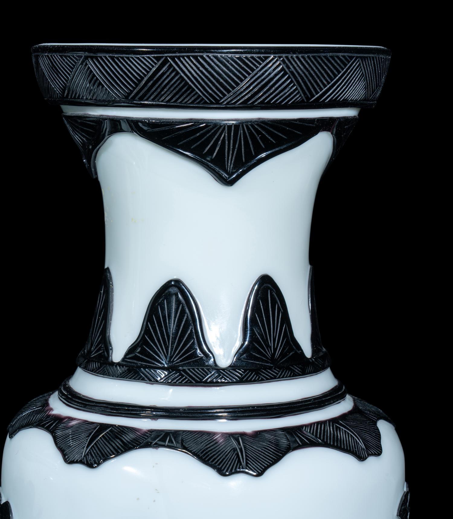 A Pair of Chinese Black Overlay White Ground Peking Glass Vases
