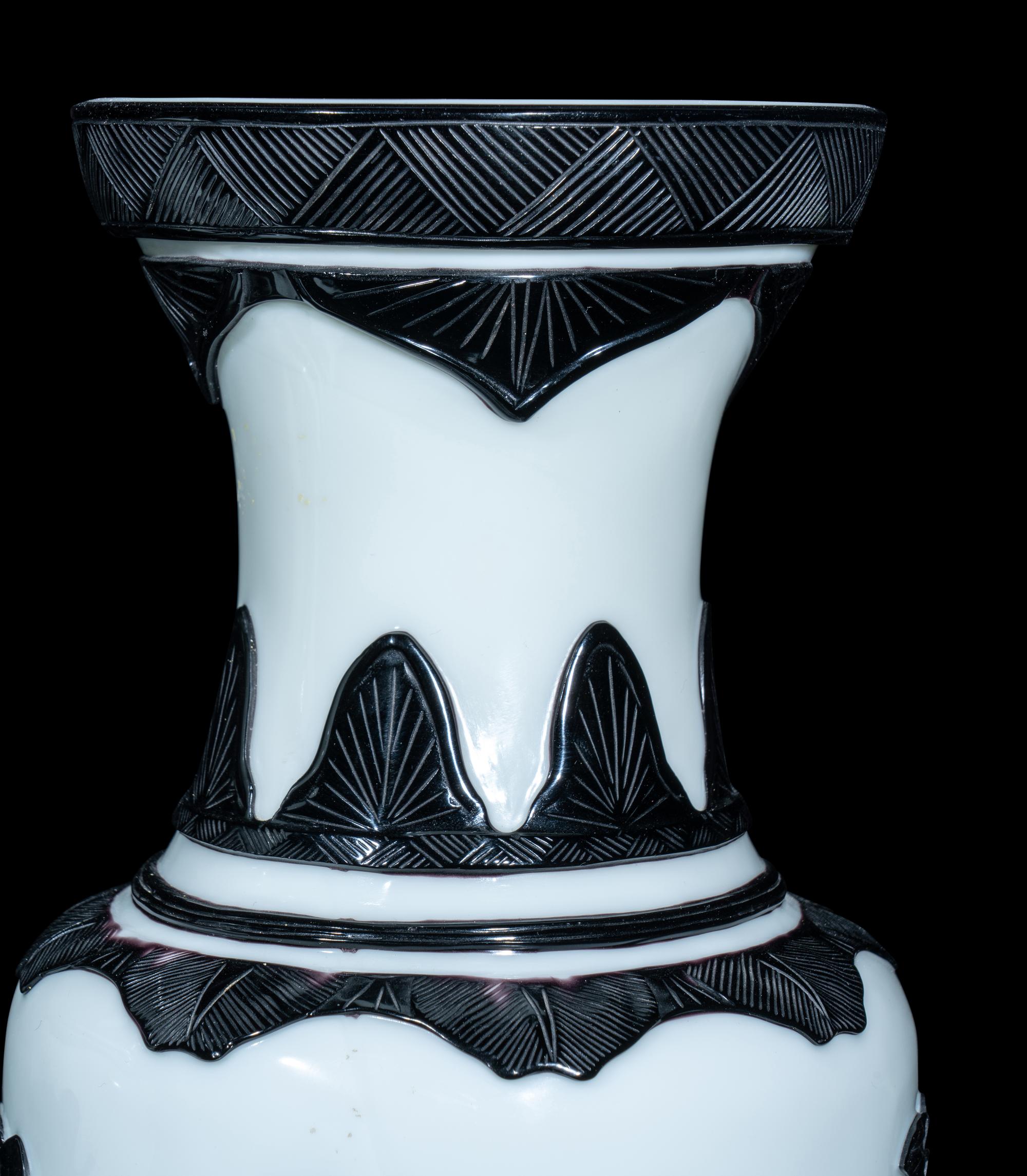 A Pair of Chinese Black Overlay White Ground Peking Glass Vases
