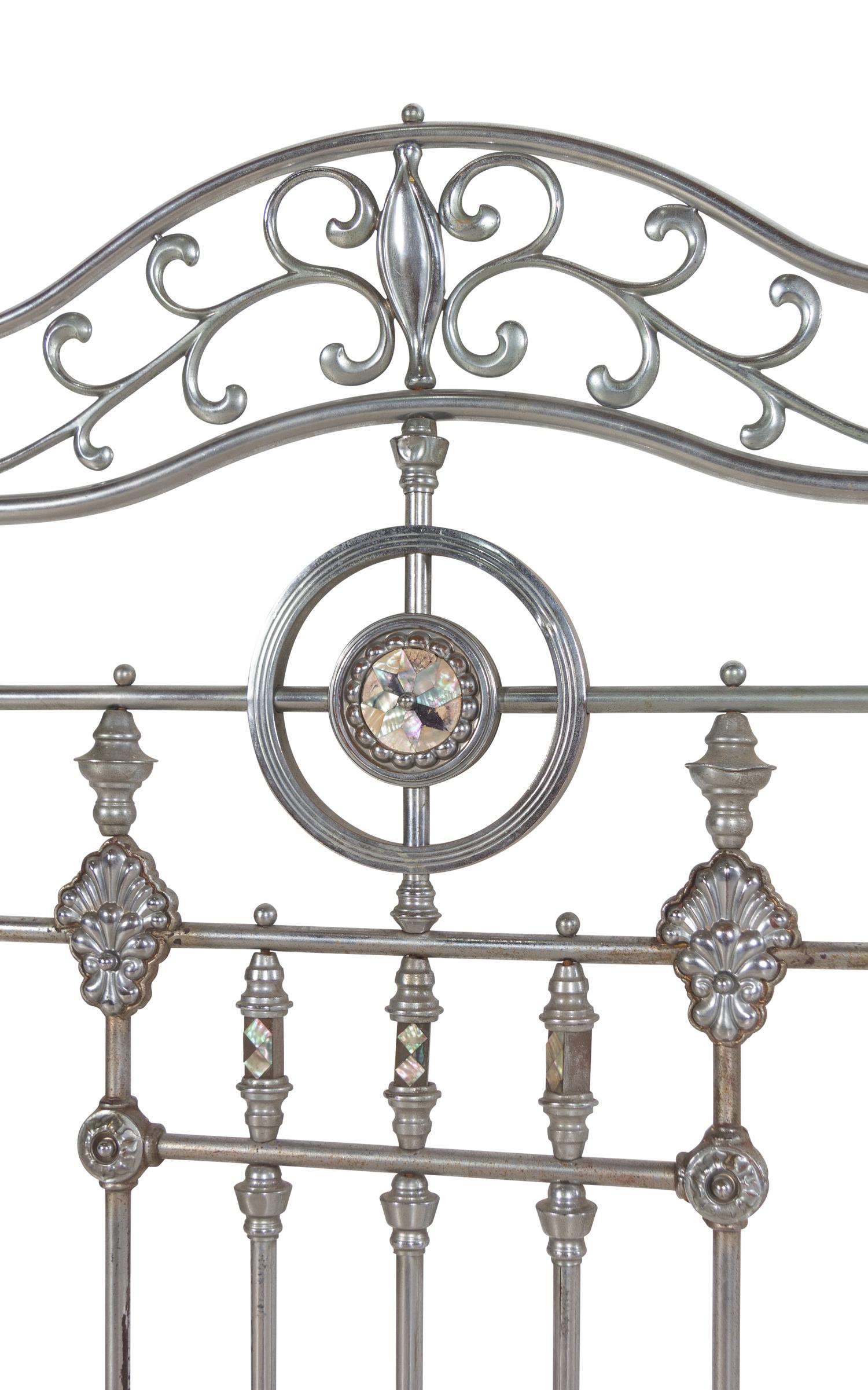 A Continental Steel Four-Post Bed