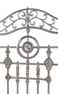 A Continental Steel Four-Post Bed