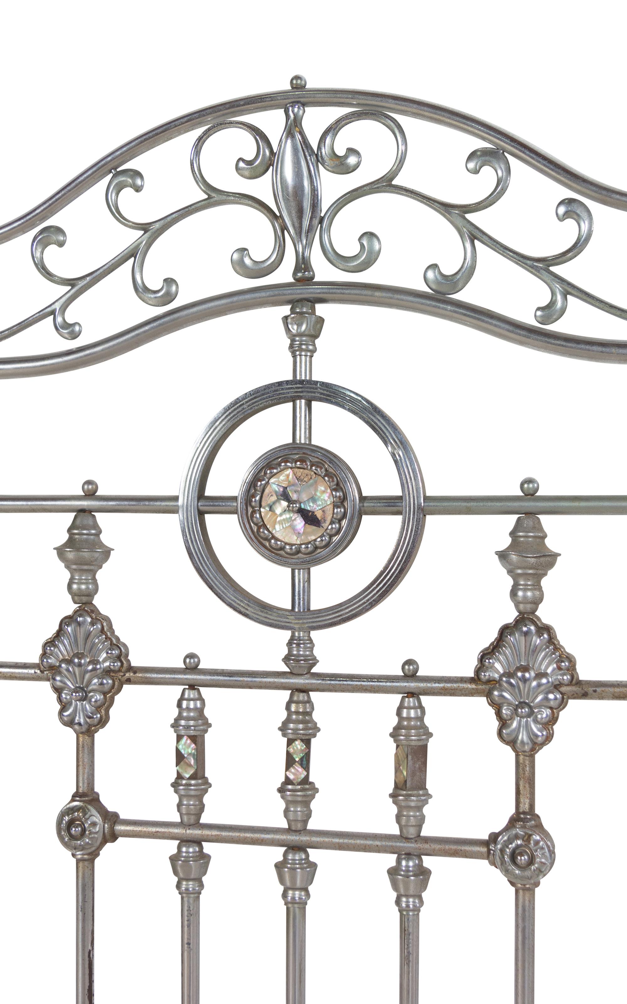 A Continental Steel Four-Post Bed
