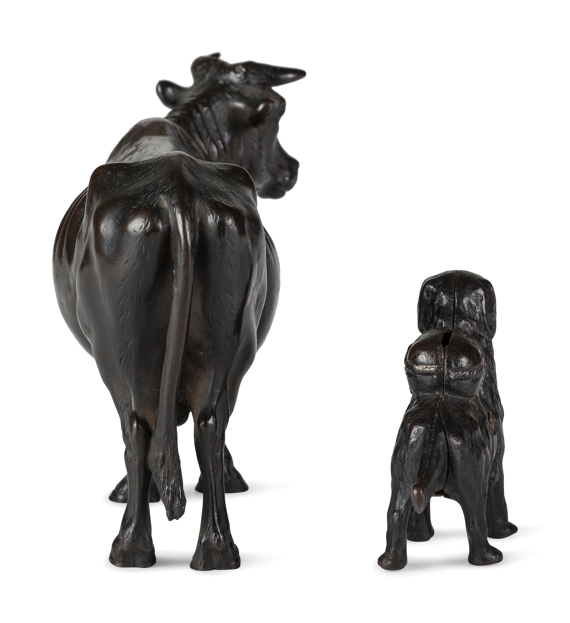 A Meiji Bronze Figure of a Bull and a Dog-Form Cast Iron Still Bank