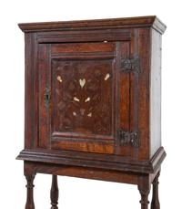 An Italian Walnut and Mother-of-Pearl Inlaid Cabinet on Stand