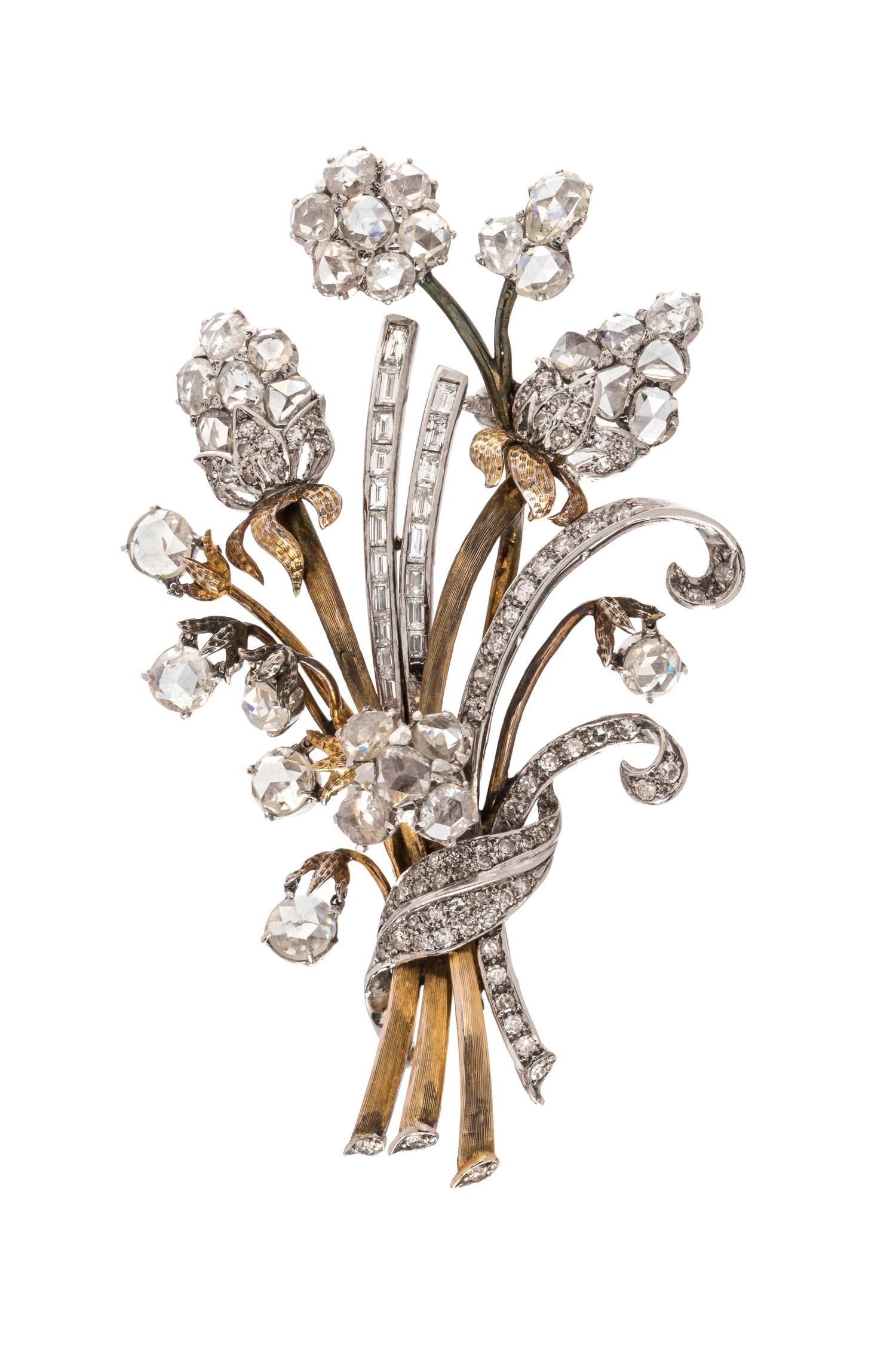 A Bicolor Gold and Diamond En Tremblant Brooch,