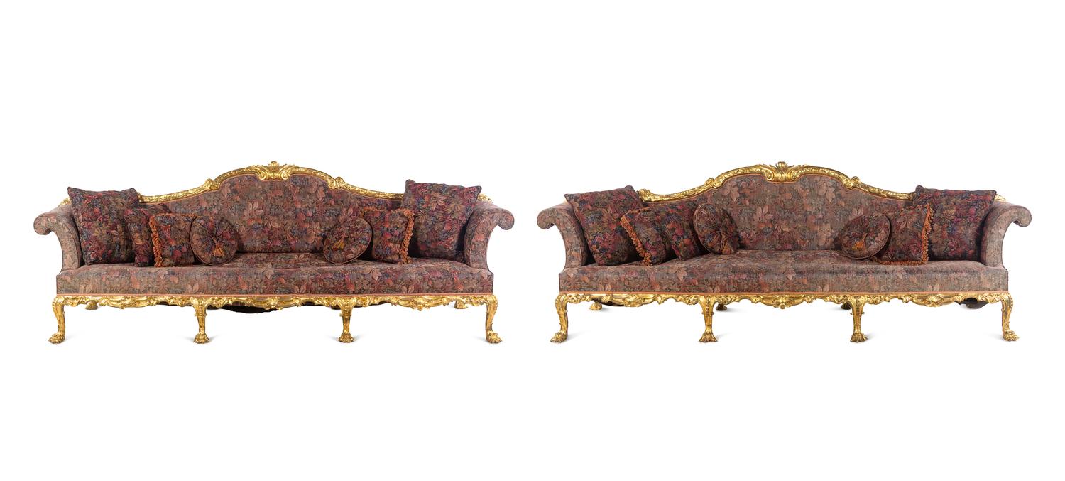 A Pair of George II Oversized Giltwood Canapés