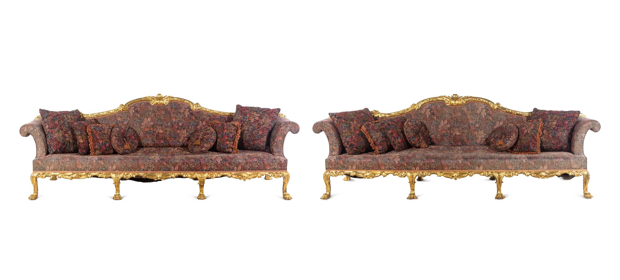 A Pair of George II Oversized Giltwood Canapés