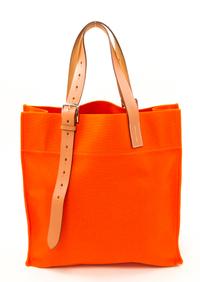 An Hermès Orange Canvas Etiviere Shopping Tote, 16" x 17" x 6"; Strap adjustable to 17".