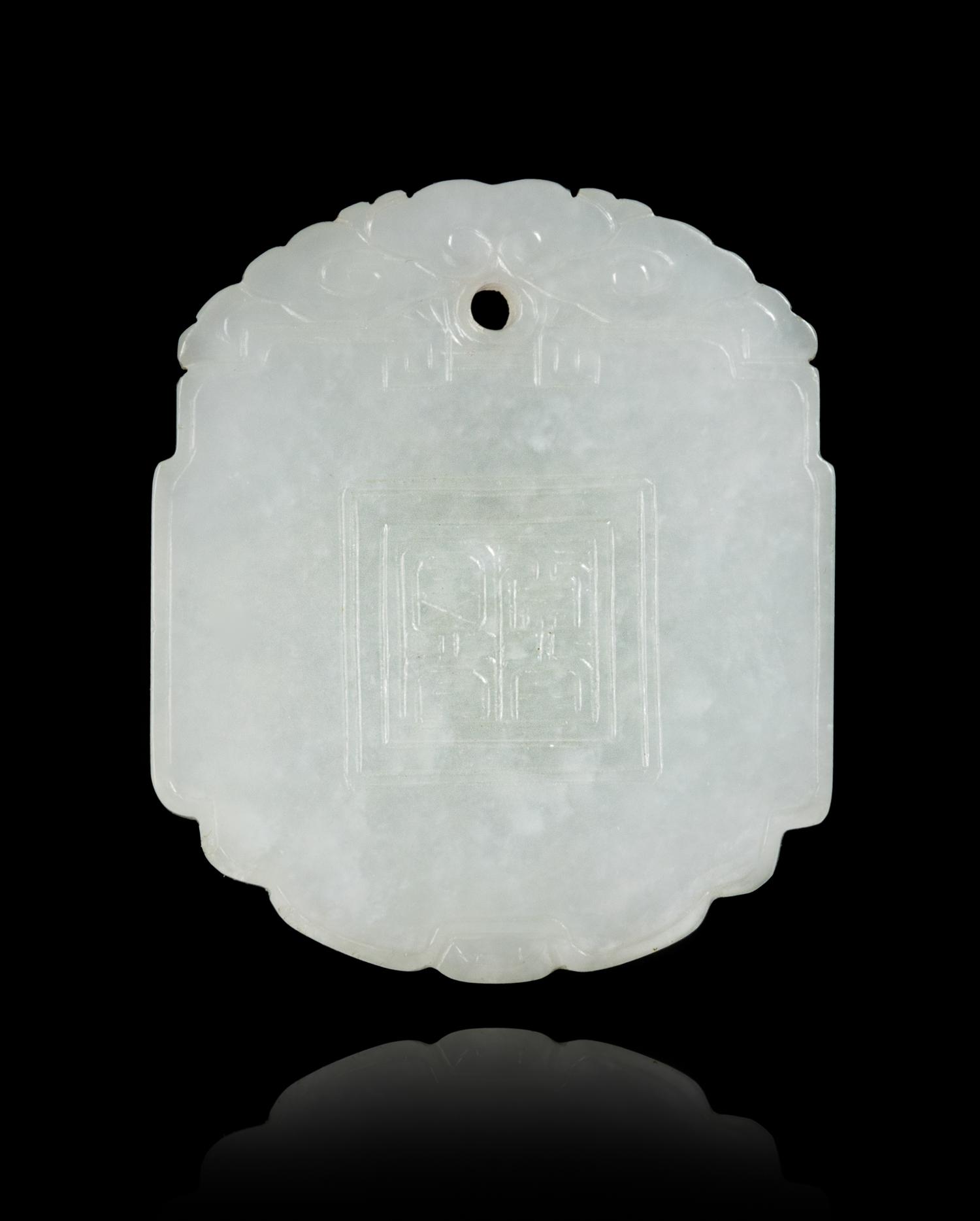 A Carved White Jade Plaque Length 2 inches. — 18TH CENTURY
